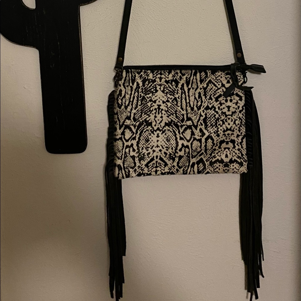 American Darling crossbody. Never never used!